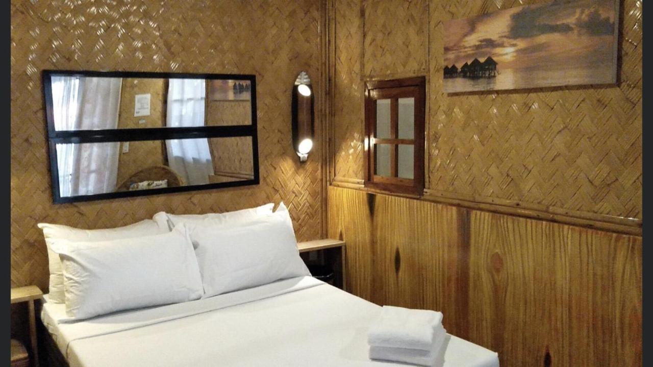 Hut Sunset Island View Hotel El Nido Bagian luar foto