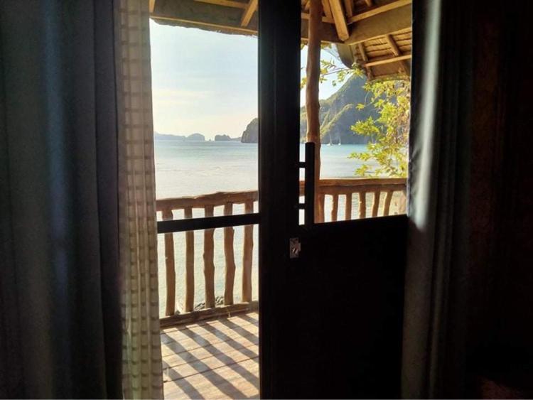 Hut Sunset Island View Hotel El Nido Bagian luar foto
